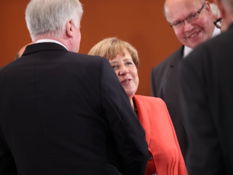 Horst Seehofer, Angela Merkel und Peter Altmaier, über dts Nachrichtenagentur