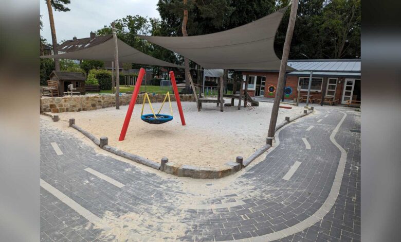 Kinder spielen auf dem Spielplatz der Kita Kunterbunt in Lingen